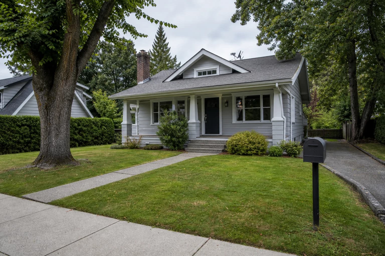 Plain craftsman front yard before landscape design