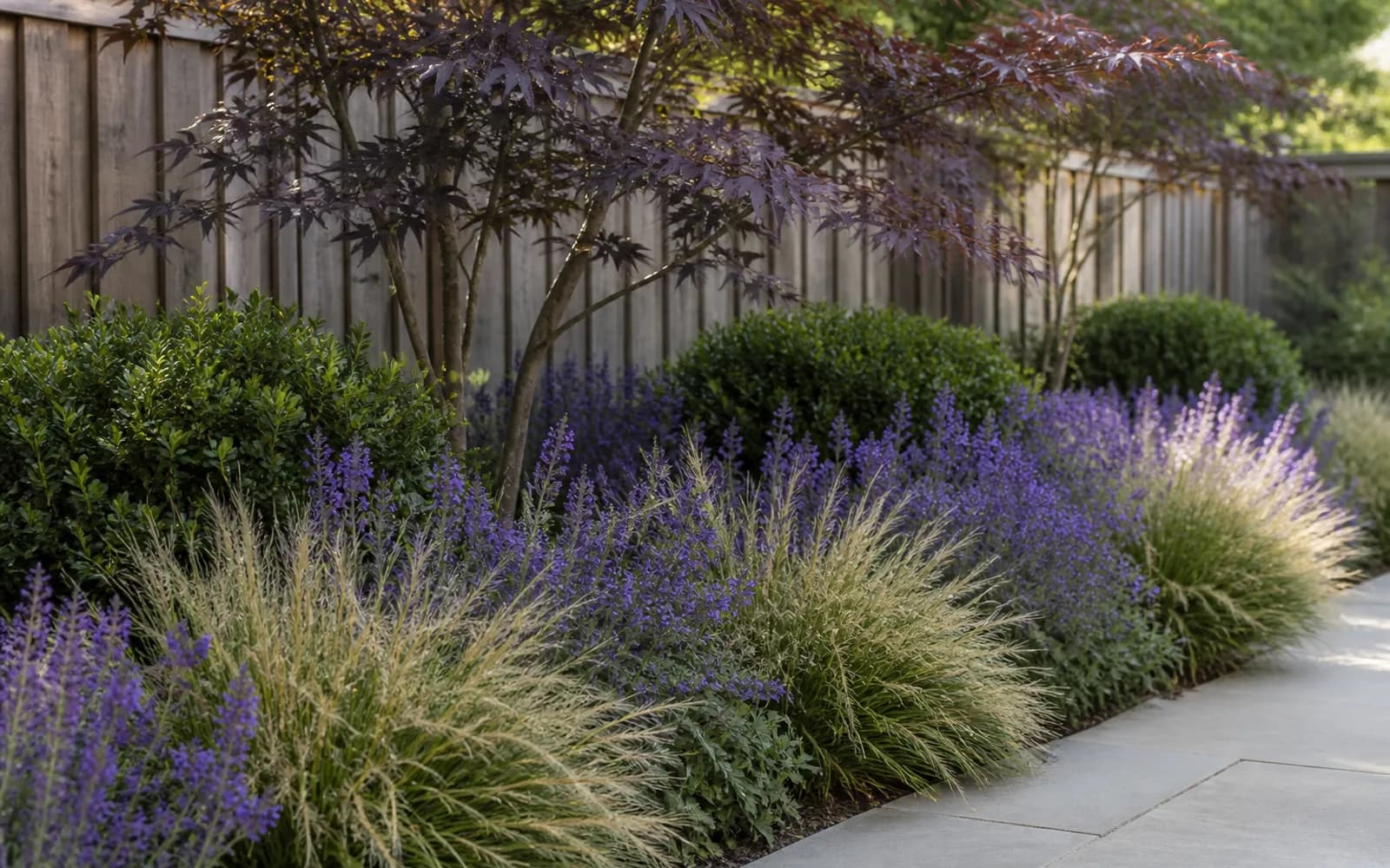 Small backyard landscaping inspiration: Repeat a short list of site-appropriate plants